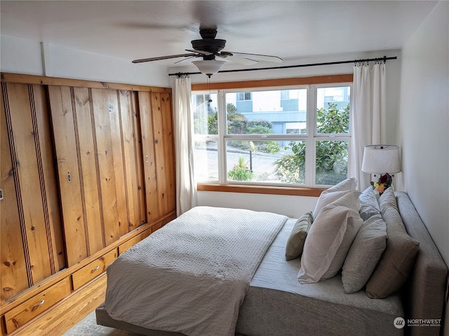 2142 Alki Ave SW Unit 1-5, Seattle, WA 98116 - bedroom with wood-type flooring and ceiling fan