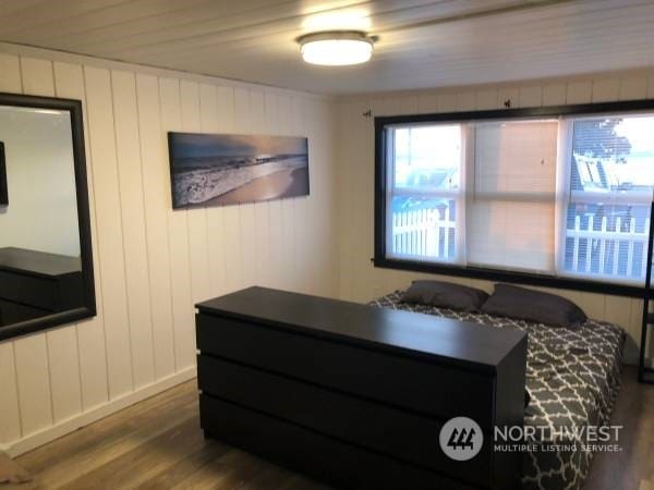 2142 Alki Ave SW Unit 1-5, Seattle, WA 98116 - bedroom with dark hardwood / wood-style flooring