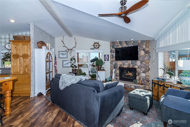 205 Fairway Pl SW, Mattawa, WA 99349 - living area featuring lofted ceiling, ceiling fan, a stone fireplace, and dark wood finished floors