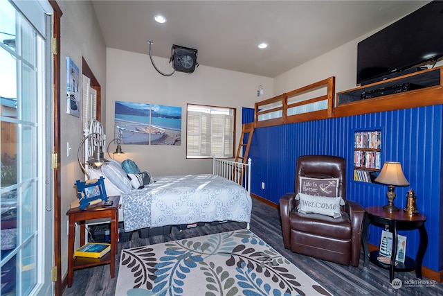 bedroom featuring dark hardwood / wood-style flooring