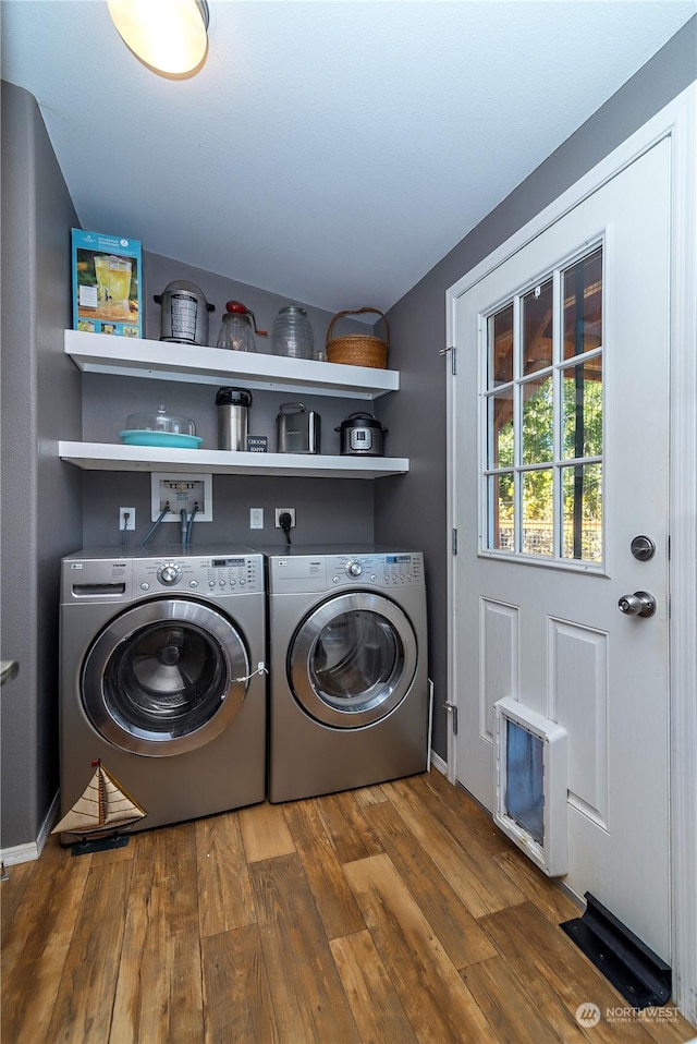 205 Fairway Pl SW, Mattawa, WA 99349 - laundry room with washer and dryer and wood finished floors