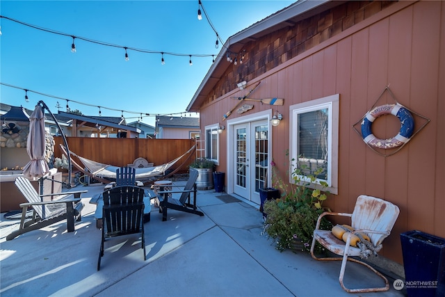 view of patio featuring french doors