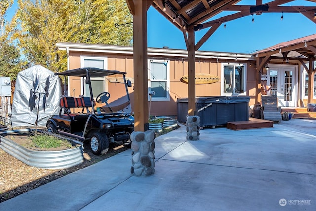 205 Fairway Pl SW, Mattawa, WA 99349 - view of patio / terrace featuring a hot tub and french doors