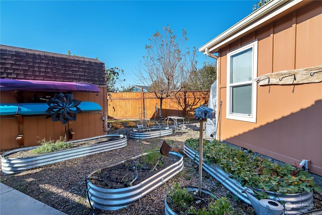 205 Fairway Pl SW, Mattawa, WA 99349 - view of yard with a vegetable garden, fence, and a hot tub