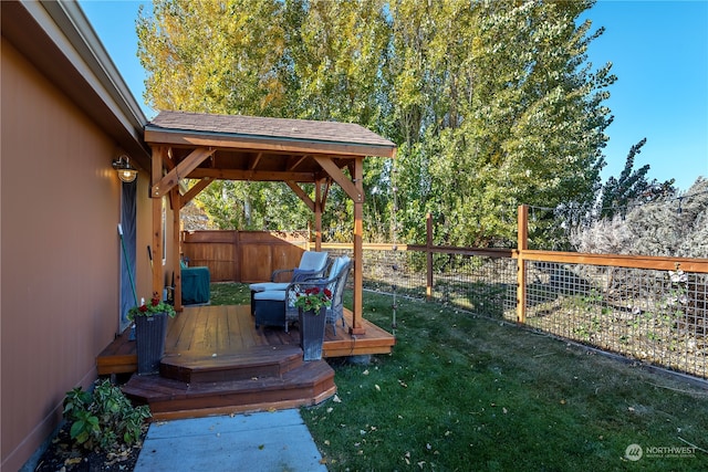 view of yard featuring a gazebo and a wooden deck