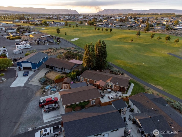 205 Fairway Pl SW, Mattawa, WA 99349 - aerial view at dusk of a mountain view, a residential view, and golf course view