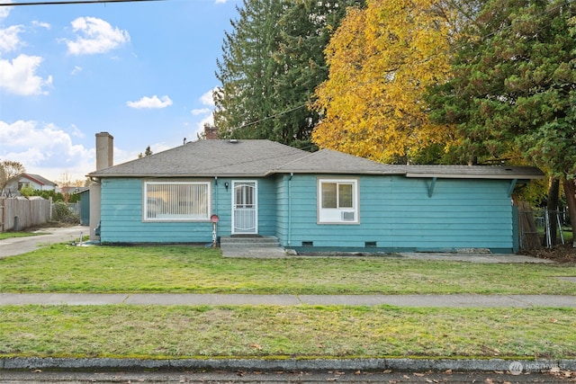 view of front of home featuring a front yard