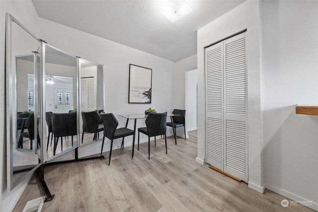 interior space featuring light wood-type flooring and ceiling fan