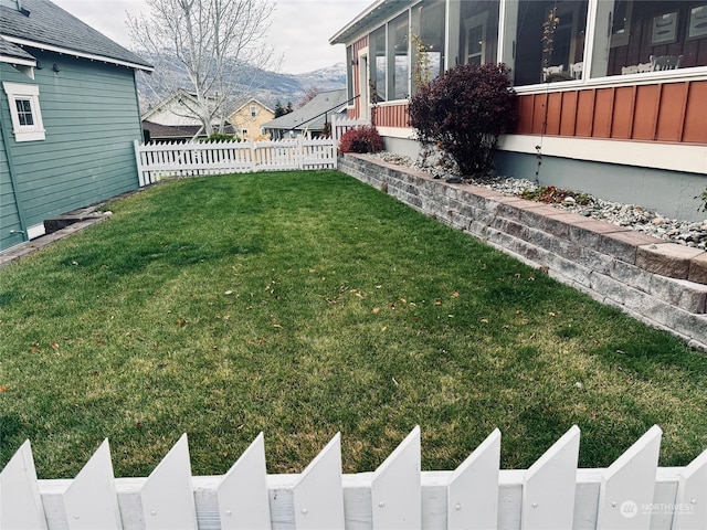 view of yard with a sunroom