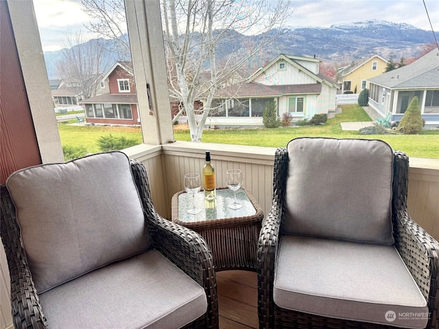 exterior space with a mountain view and a wealth of natural light