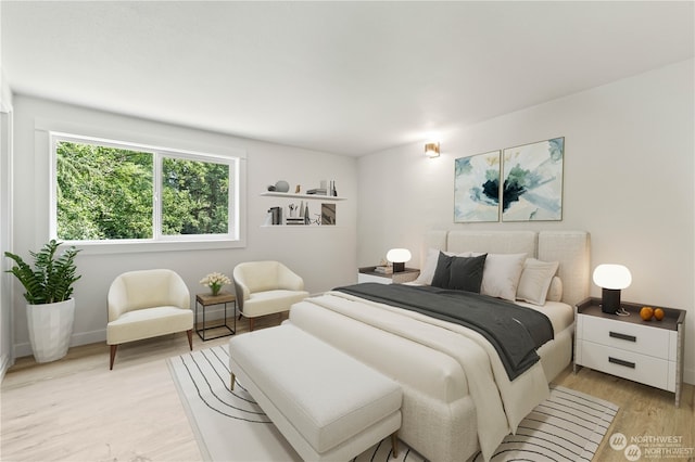 bedroom with light hardwood / wood-style flooring