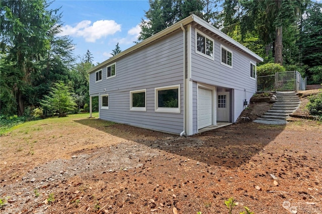 view of home's exterior with a garage