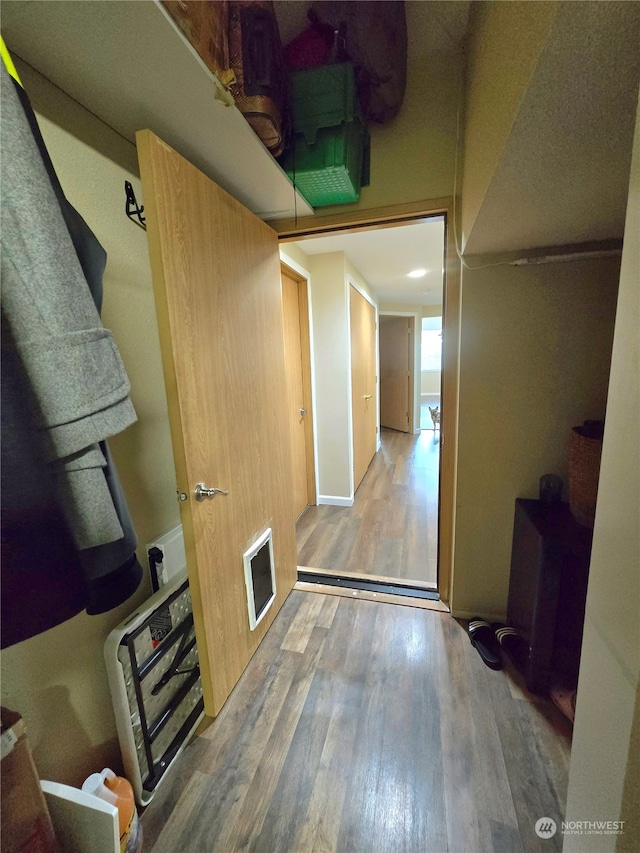 corridor featuring hardwood / wood-style flooring