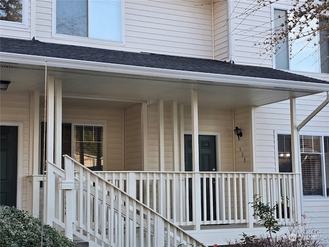 property entrance featuring a porch