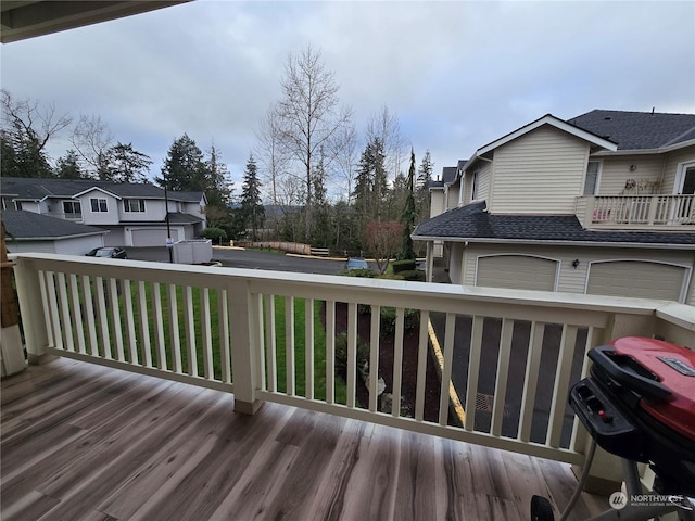 wooden terrace featuring area for grilling