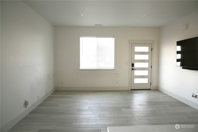 foyer entrance featuring light hardwood / wood-style flooring