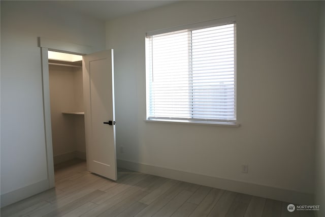 unfurnished bedroom featuring light hardwood / wood-style flooring