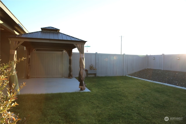 view of yard with a gazebo and a patio area