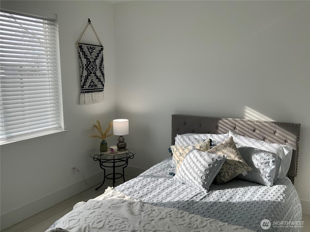 bedroom with hardwood / wood-style floors