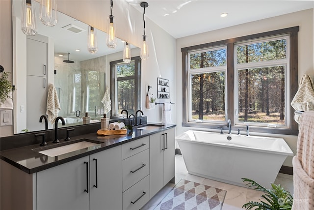 bathroom with vanity and plus walk in shower