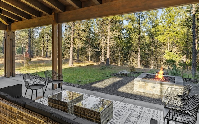 view of patio featuring an outdoor fire pit