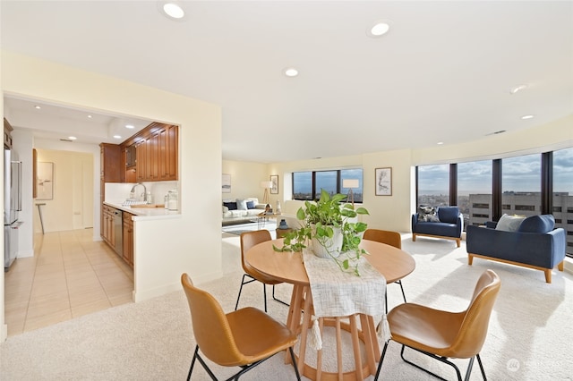 tiled dining room with sink