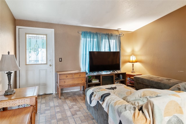 living room with lofted ceiling