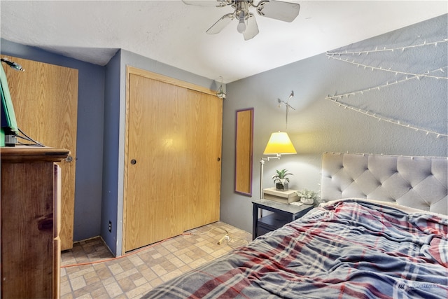 bedroom featuring a closet and ceiling fan