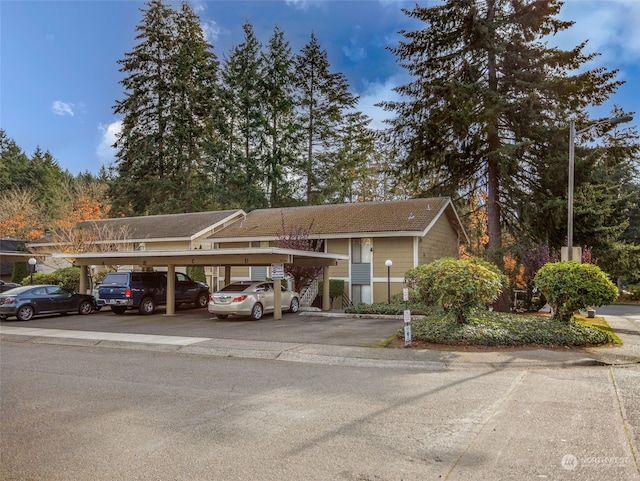 view of car parking featuring a carport