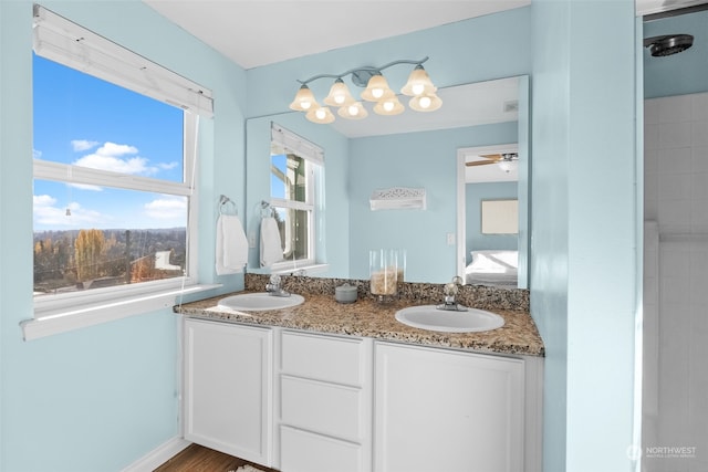 404 E 31st St, Bremerton, WA 98310 - bathroom with hardwood / wood-style flooring, vanity, and ceiling fan