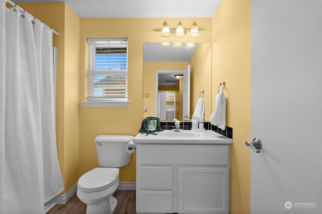 404 E 31st St, Bremerton, WA 98310 - bathroom with toilet, vanity, and wood-type flooring