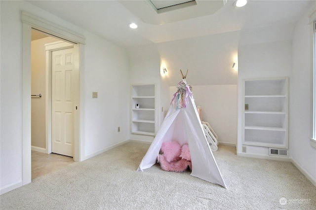 playroom featuring light colored carpet