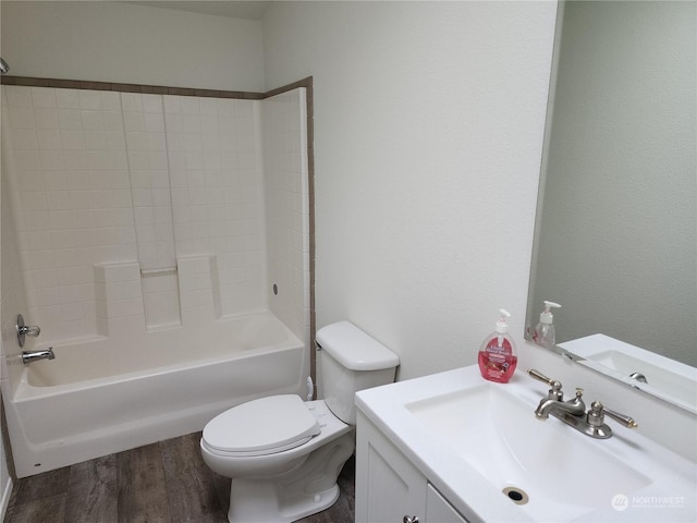 full bathroom featuring shower / tub combination, hardwood / wood-style floors, vanity, and toilet