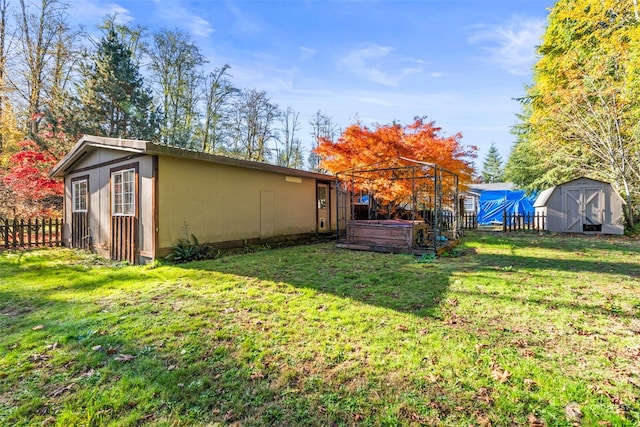 view of yard featuring a storage shed and a gazebo