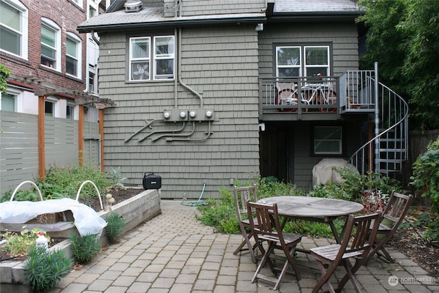 rear view of house with a patio area