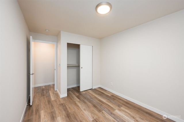 unfurnished bedroom with light hardwood / wood-style flooring