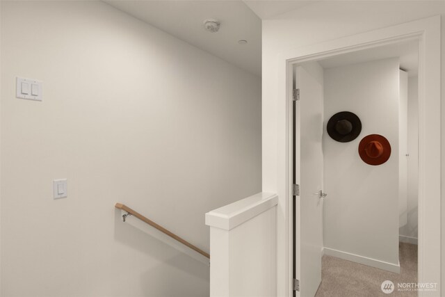 9211C Densmore Ave N, Seattle, WA 98103 - hallway with an upstairs landing and carpet