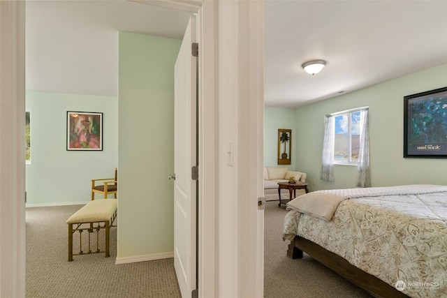 bedroom with light carpet