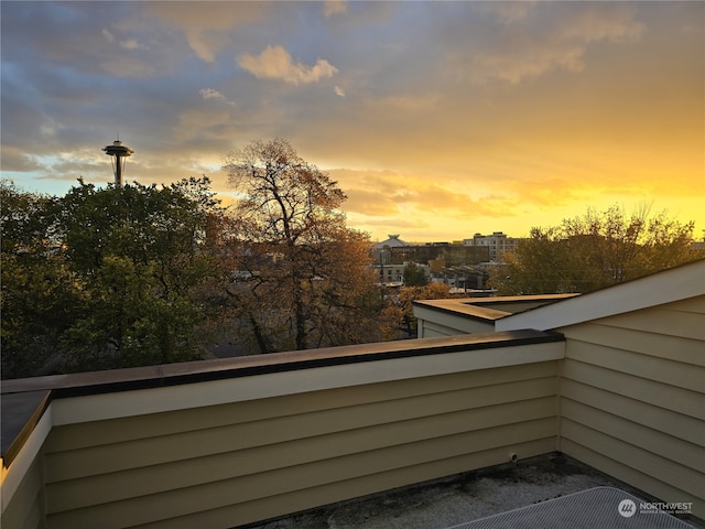 view of balcony at dusk