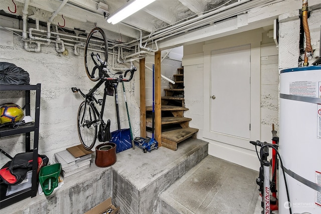 basement with strapped water heater