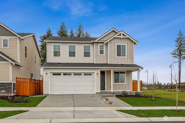 craftsman house featuring a garage, a porch, and a front lawn