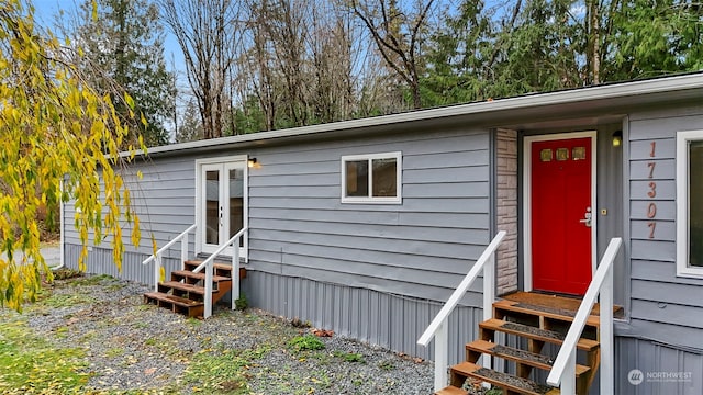 doorway to property featuring french doors