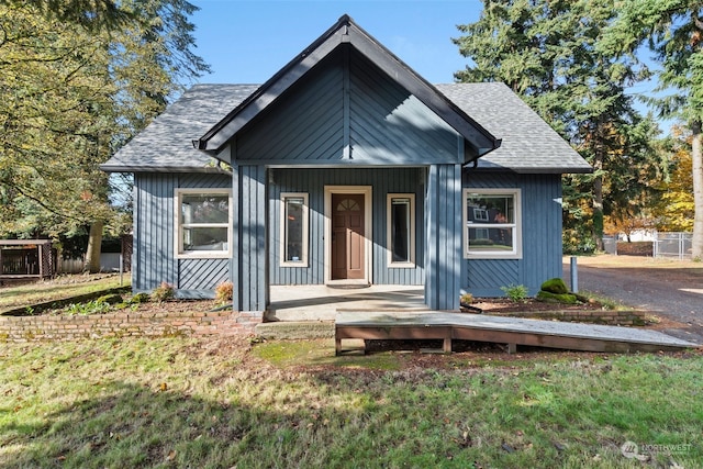 bungalow with a front yard