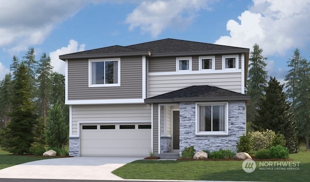 view of front of house featuring a garage and a front lawn