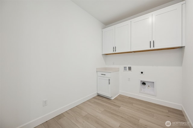 laundry room with baseboards, washer hookup, light wood-style flooring, cabinet space, and hookup for an electric dryer