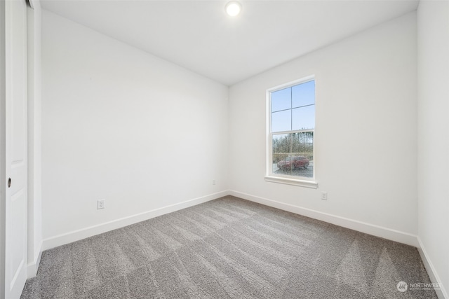 empty room featuring carpet flooring