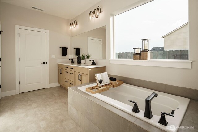 25708 64th Avenue Ct E Unit 4, Graham, WA 98338 - bathroom featuring double vanity and a bath