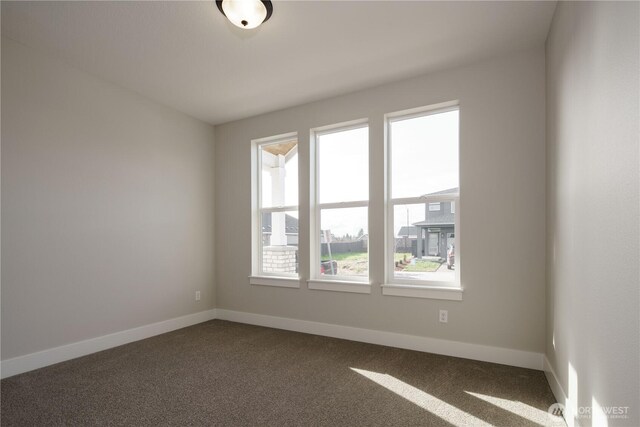 25708 64th Avenue Ct E Unit 4, Graham, WA 98338 - empty room with dark carpet and baseboards