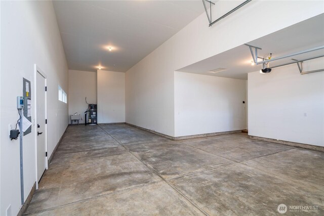 25708 64th Avenue Ct E Unit 4, Graham, WA 98338 - garage featuring baseboards