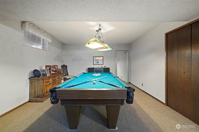 rec room featuring light carpet, a textured ceiling, and billiards